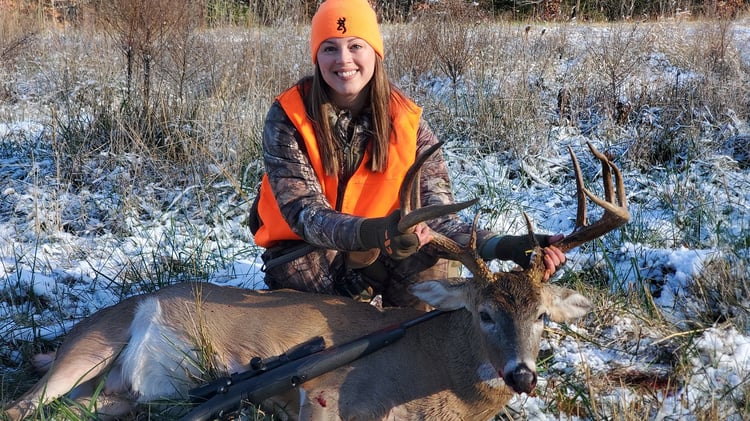 Andrea beat bowhunting burnout and harvested a whitetail during the rifle hunt.