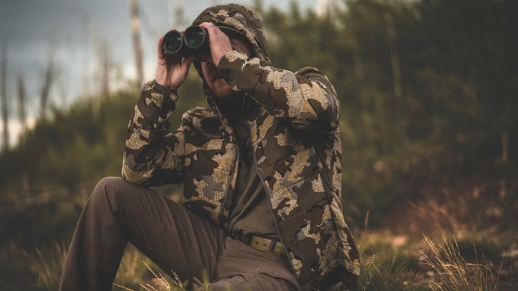 Man with hunting binoculars.